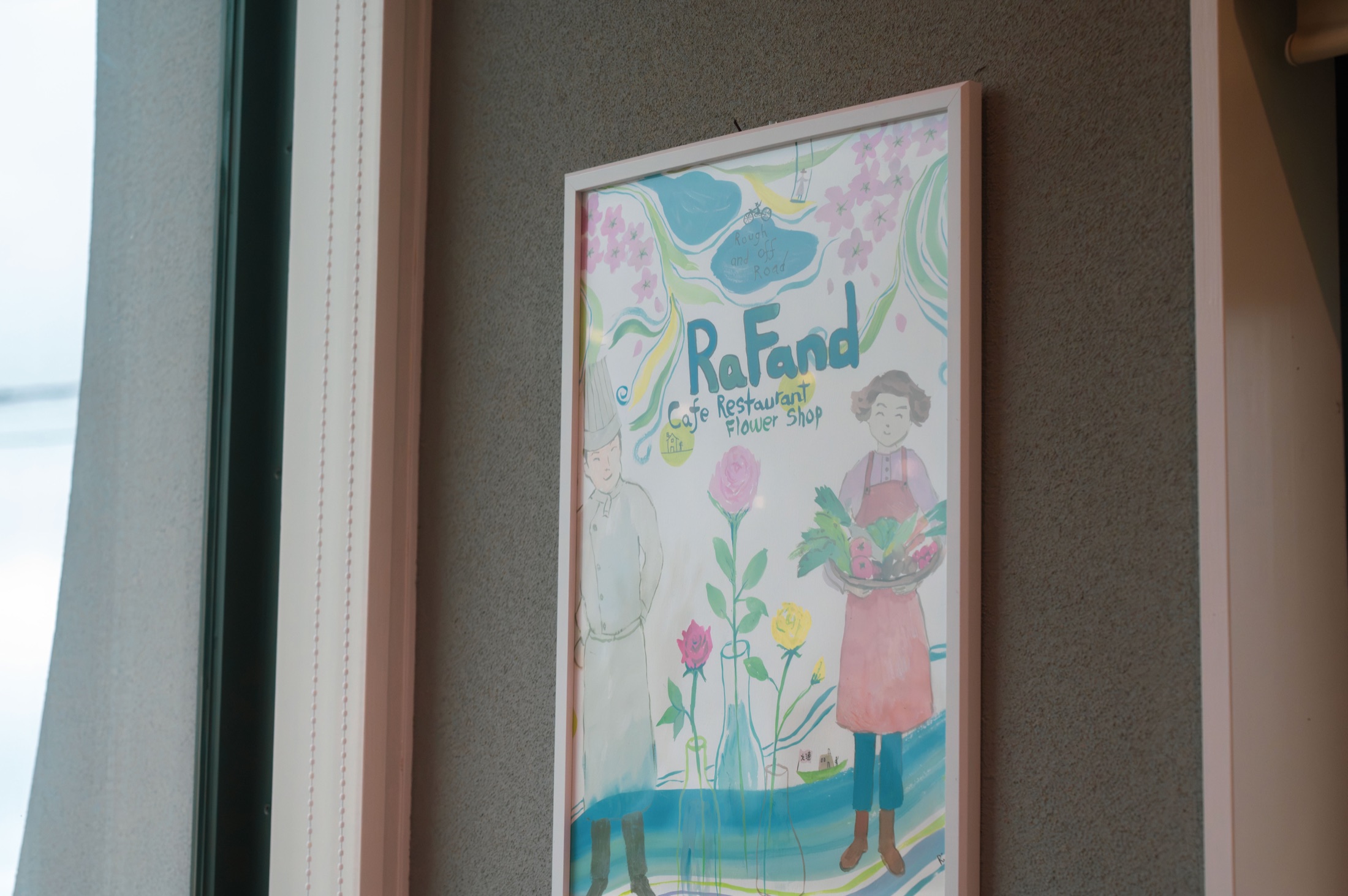 RaFandの店内に飾られた、料理人と花を描いた絵